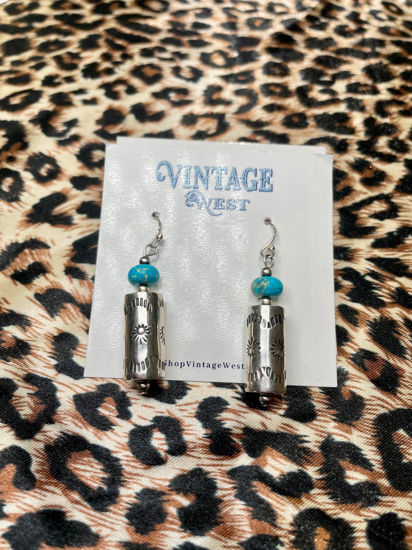 Cylinder Stamped Dangle earrings.