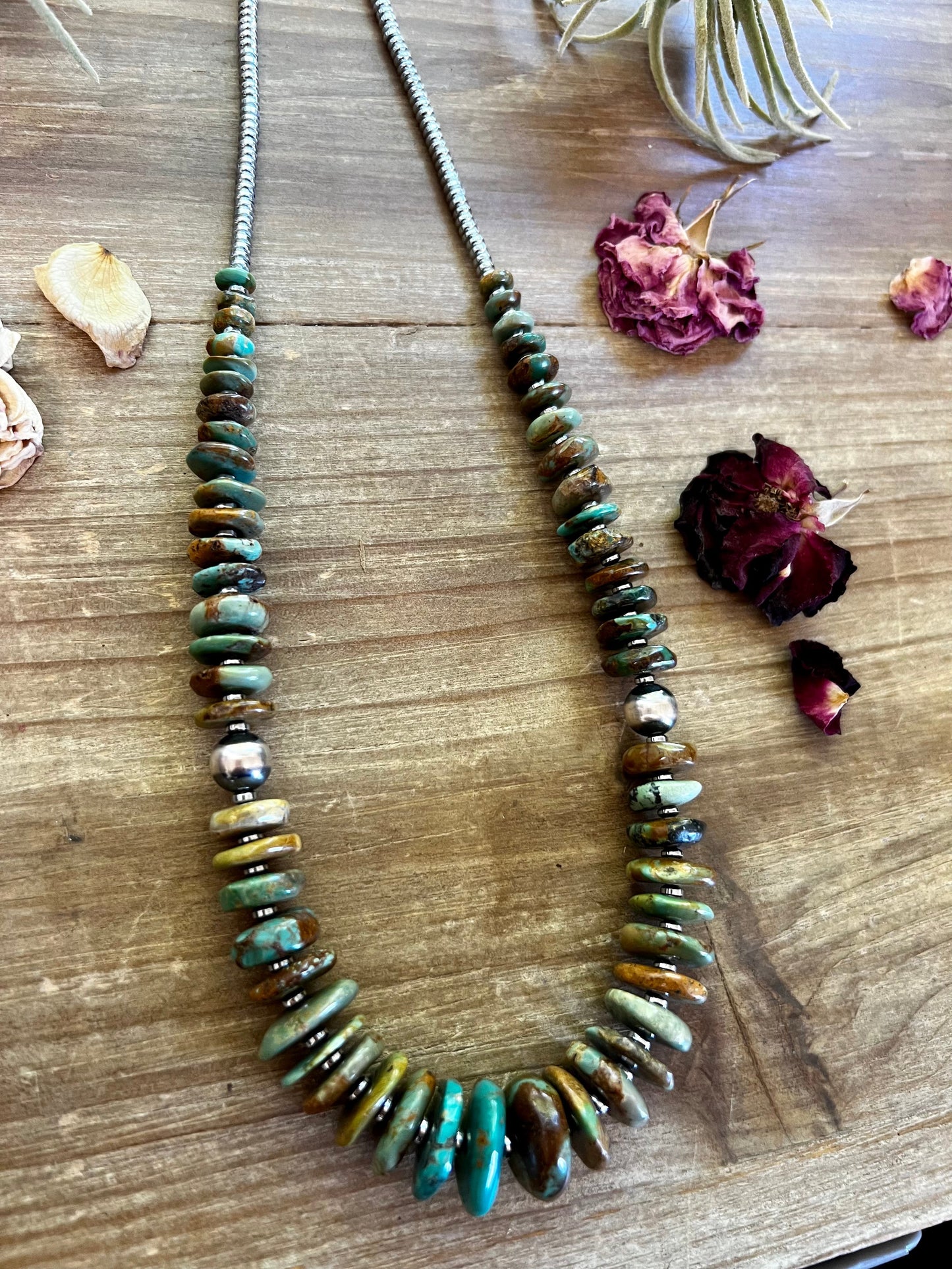 22 inch graduated turquoise necklace with Sterling silver pearls